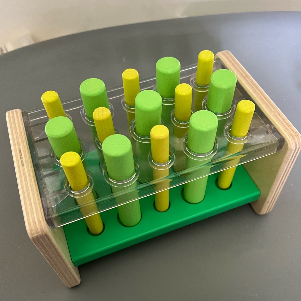 Lovevery posting stand stick toy